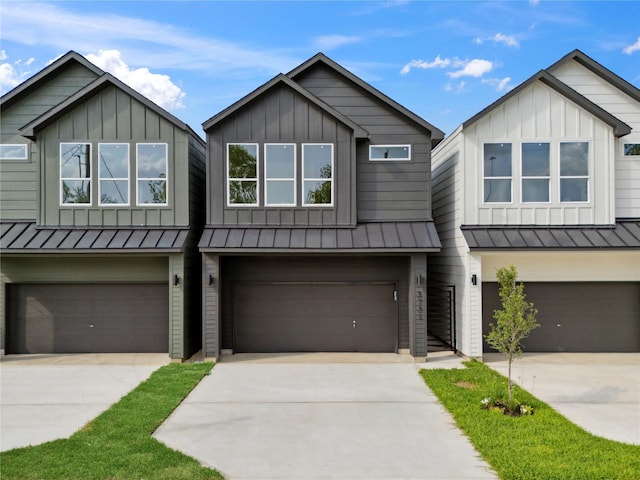 3731 Lydia St, Houston, TX 77021 - multi unit property with a standing seam roof, an attached garage, and board and batten siding