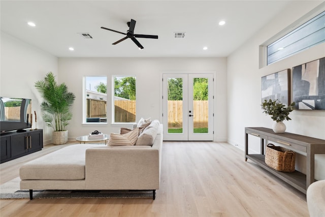 3731 Lydia St, Houston, TX 77021 - living area with light wood finished floors, french doors, recessed lighting, a ceiling fan, and baseboards