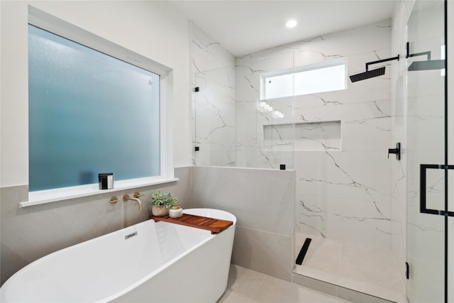 3731 Lydia St, Houston, TX 77021 - bathroom with a marble finish shower and a freestanding bath
