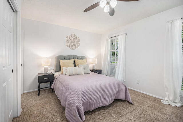 763 Voyager Dr, Houston, TX 77062 - carpeted bedroom with baseboards, a ceiling fan, and a closet