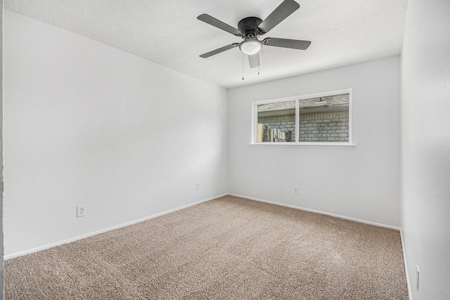 763 Voyager Dr, Houston, TX 77062 - carpeted empty room featuring a ceiling fan, baseboards, and a textured ceiling
