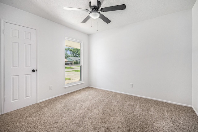 763 Voyager Dr, Houston, TX 77062 - carpeted empty room with ceiling fan, baseboards, and a textured ceiling
