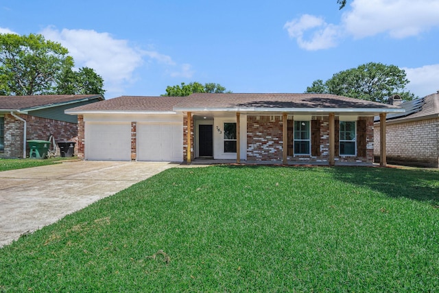 763 Voyager Dr, Houston, TX 77062 - single story home featuring an attached garage, a front yard, concrete driveway, brick siding, and covered porch