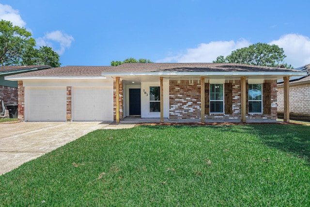 763 Voyager Dr, Houston, TX 77062 - ranch-style house featuring an attached garage, a porch, a front lawn, brick siding, and driveway