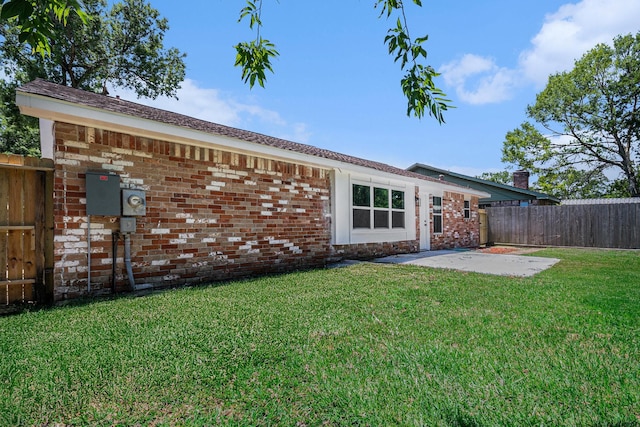 763 Voyager Dr, Houston, TX 77062 - rear view of house featuring a patio area and brick siding