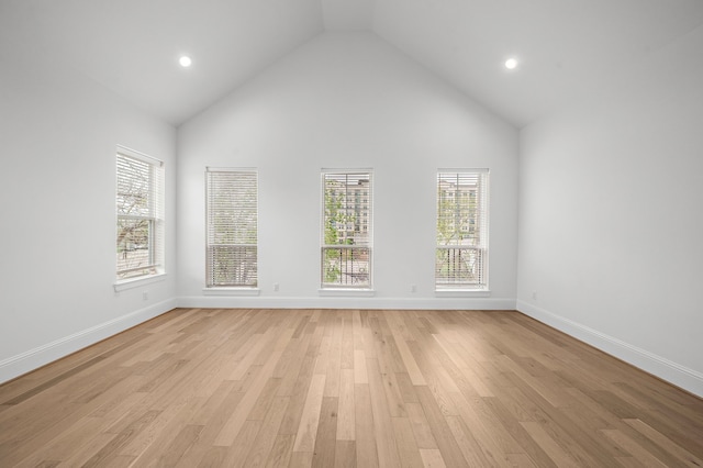 1435 Laird St, Houston, TX 77008 - additional living space with healthy amount of natural light, baseboards, light wood-style floors, high vaulted ceiling, and recessed lighting
