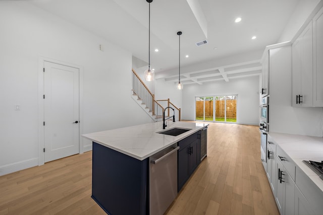 1435 Laird St, Houston, TX 77008 - kitchen featuring a sink, stainless steel appliances, light wood-style flooring, open floor plan, and recessed lighting