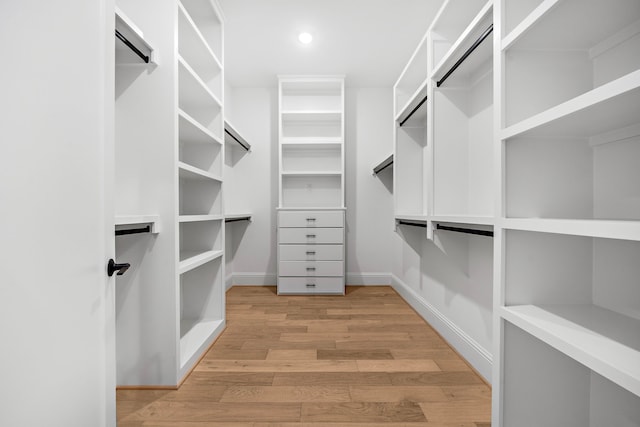 1435 Laird St, Houston, TX 77008 - walk in closet with light wood-style flooring