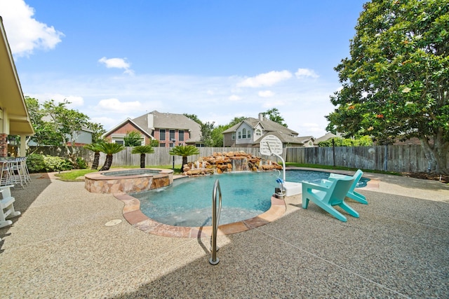 8303 Big Bend Dr, Sugar Land, TX 77479 - view of swimming pool featuring a fenced backyard, a patio area, and a shed