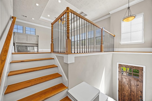 1380 Studer St, Houston, TX 77007 - stairway with crown molding, recessed lighting, and a tray ceiling