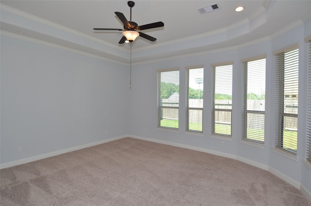 15818 Tremout Hollow Ln, Houston, TX 77044 - carpeted empty room with a raised ceiling, crown molding, a ceiling fan, baseboards, and recessed lighting