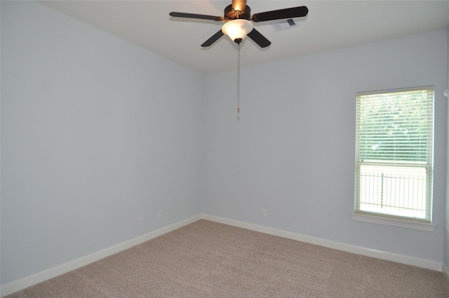 15818 Tremout Hollow Ln, Houston, TX 77044 - spare room with light colored carpet, baseboards, and ceiling fan