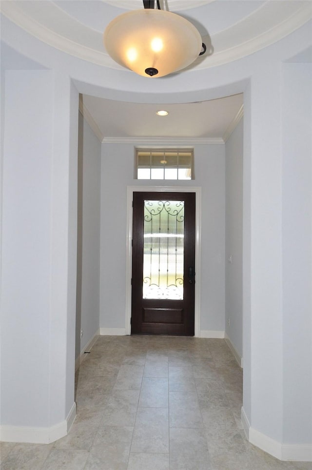 15818 Tremout Hollow Ln, Houston, TX 77044 - foyer with crown molding, baseboards, and a raised ceiling