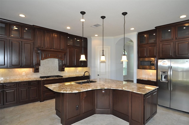 15818 Tremout Hollow Ln, Houston, TX 77044 - kitchen featuring stainless steel appliances, a sink, a center island with sink, tasteful backsplash, and crown molding