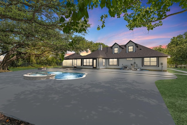 16610 Meadow Ln Unit Cr438, Danbury, TX 77534 - view of swimming pool featuring a patio area and a pool with connected hot tub