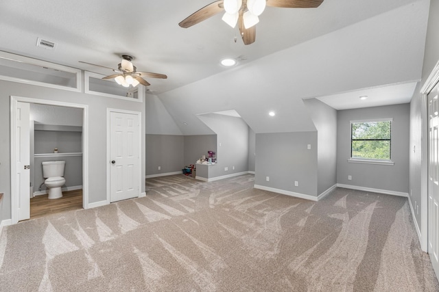 16610 Meadow Ln Unit Cr438, Danbury, TX 77534 - additional living space with ceiling fan, carpet floors, baseboards, and vaulted ceiling