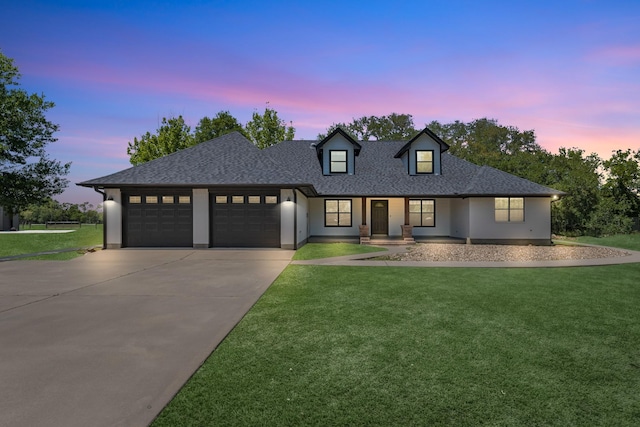 16610 Meadow Ln Unit Cr438, Danbury, TX 77534 - modern farmhouse featuring an attached garage, a front yard, driveway, and a shingled roof