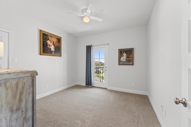 2006 Green Haven Ct, Missouri City, TX 77459 - carpeted empty room featuring ceiling fan and baseboards