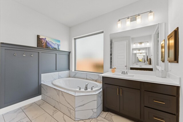 2006 Green Haven Ct, Missouri City, TX 77459 - full bathroom featuring marble finish flooring, a garden tub, and vanity