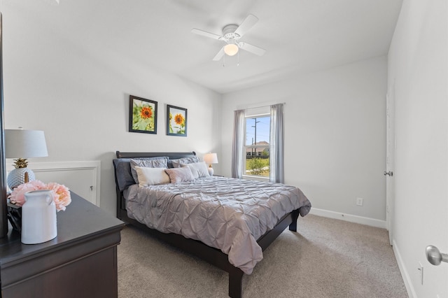 2006 Green Haven Ct, Missouri City, TX 77459 - bedroom with baseboards, light carpet, and a ceiling fan