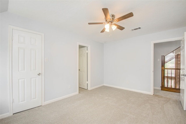 506 Windsor Glen Dr, Katy, TX 77450 - unfurnished bedroom with light colored carpet, baseboards, and ceiling fan
