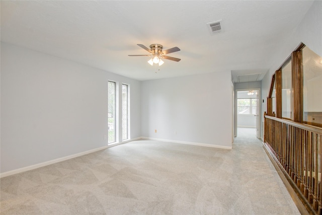506 Windsor Glen Dr, Katy, TX 77450 - empty room with attic access, healthy amount of natural light, and light colored carpet