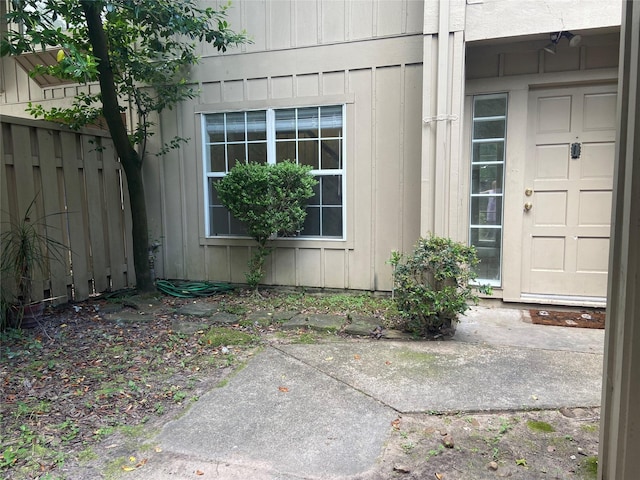 2403 W Settlers Way, Spring, TX 77380 - entrance to property featuring board and batten siding