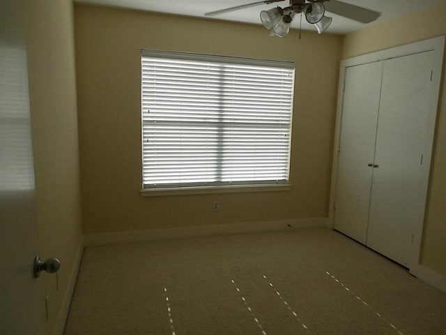 3501 Link Valley Dr Unit 1004, Houston, TX 77025 - unfurnished bedroom featuring baseboards, a closet, and a ceiling fan