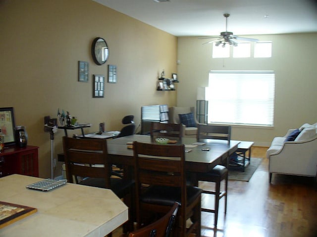 3501 Link Valley Dr Unit 1004, Houston, TX 77025 - dining space featuring a ceiling fan and wood finished floors