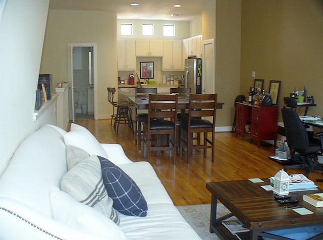 3501 Link Valley Dr Unit 1004, Houston, TX 77025 - living room featuring light wood-style floors and recessed lighting