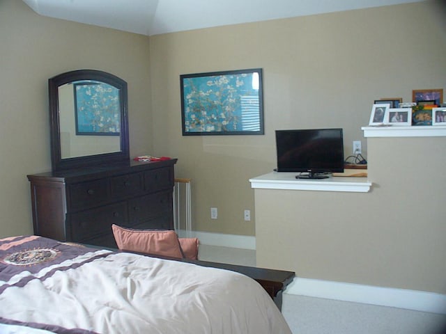 3501 Link Valley Dr Unit 1004, Houston, TX 77025 - bedroom featuring vaulted ceiling