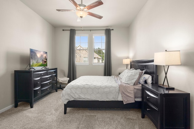 255 S Spotted Fern Dr, Montgomery, TX 77316 - bedroom featuring light carpet, a ceiling fan, and baseboards
