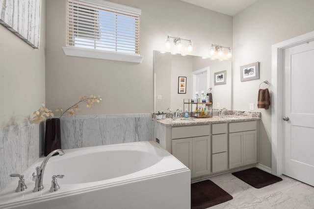 255 S Spotted Fern Dr, Montgomery, TX 77316 - full bath featuring double vanity, a garden tub, and marble finish flooring