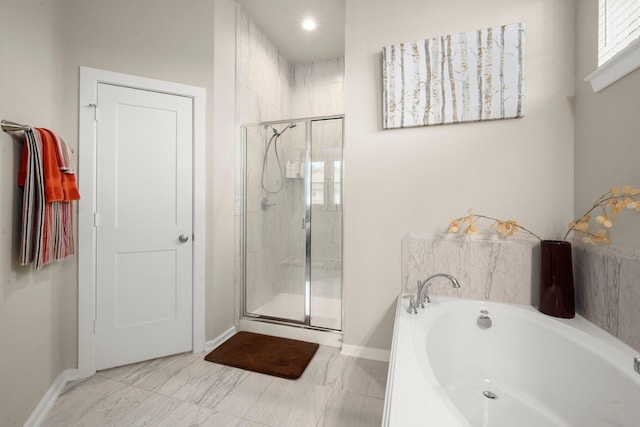 255 S Spotted Fern Dr, Montgomery, TX 77316 - bathroom with a garden tub, a stall shower, and baseboards