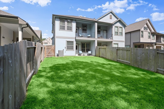 255 S Spotted Fern Dr, Montgomery, TX 77316 - back of house featuring a balcony and central AC