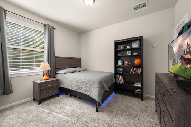 255 S Spotted Fern Dr, Montgomery, TX 77316 - bedroom featuring light colored carpet and baseboards