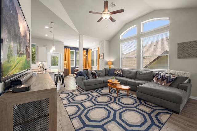 255 S Spotted Fern Dr, Montgomery, TX 77316 - living area featuring lofted ceiling, wood finished floors, ceiling fan, and recessed lighting