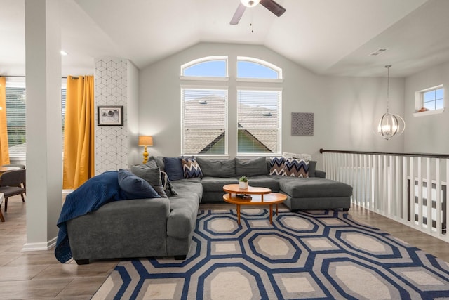 255 S Spotted Fern Dr, Montgomery, TX 77316 - living room with a ceiling fan, a chandelier, lofted ceiling, and wood finished floors