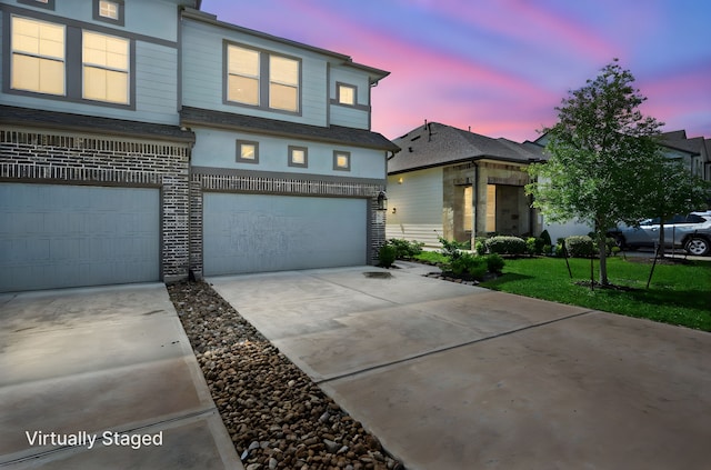 255 S Spotted Fern Dr, Montgomery, TX 77316 - view of property featuring a garage and driveway