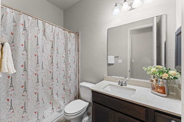 3319 Sky Run Ct, Missouri City, TX 77459 - full bathroom featuring toilet, vanity, a shower with curtain, and a textured wall