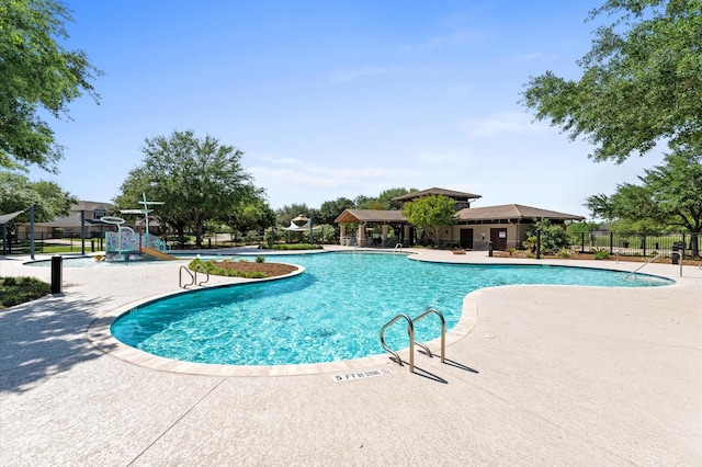 3319 Sky Run Ct, Missouri City, TX 77459 - community pool with fence and a patio