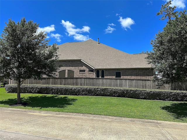 2308 Ellis Park Ln, Conroe, TX 77304 - view of home's exterior featuring brick siding