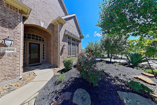 2308 Ellis Park Ln, Conroe, TX 77304 - doorway to property with brick siding