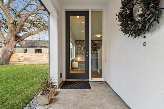 1851 Lexington St, Houston, TX 77098 - view of exterior entry featuring stucco siding and a patio