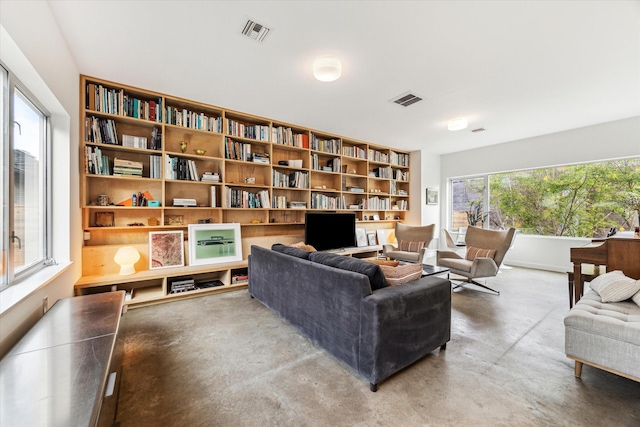 1851 Lexington St, Houston, TX 77098 - sitting room with concrete floors and baseboards