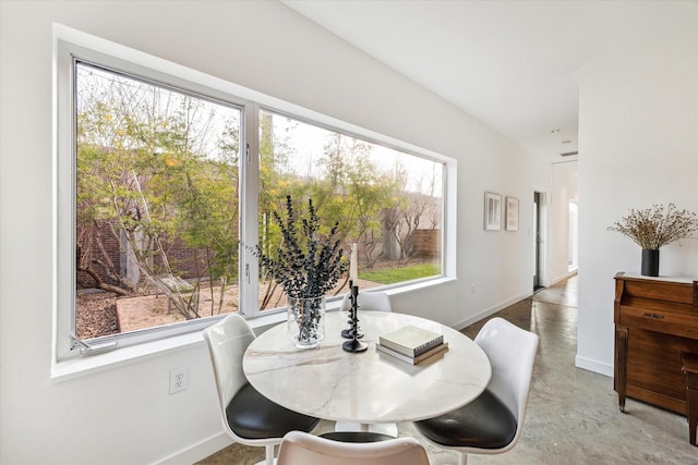 1851 Lexington St, Houston, TX 77098 - dining space featuring finished concrete floors and baseboards
