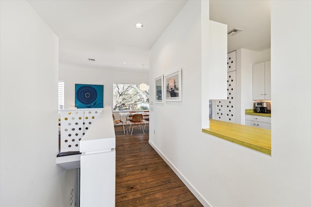 1851 Lexington St, Houston, TX 77098 - hall featuring dark wood-style floors, baseboards, and recessed lighting