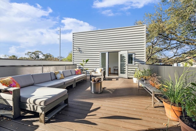 1851 Lexington St, Houston, TX 77098 - wooden terrace featuring outdoor lounge area and fence