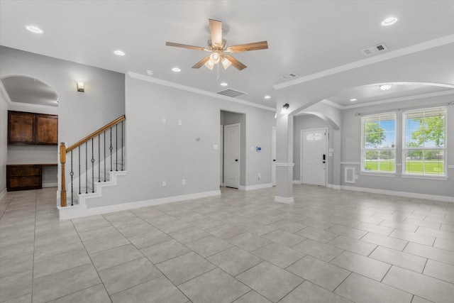 2800 Virginia Ave, League City, TX 77573 - unfurnished living room with arched walkways, a ceiling fan, ornamental molding, recessed lighting, and light tile patterned floors