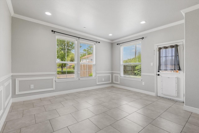 2800 Virginia Ave, League City, TX 77573 - unfurnished room with crown molding, light tile patterned flooring, a wainscoted wall, and recessed lighting